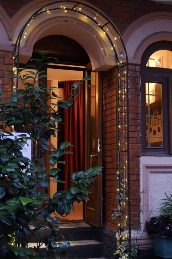 The arched entrance with fairy lights